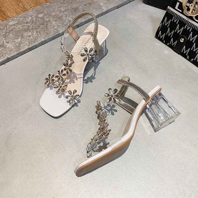 Damen High-Heels Sandalen – Transparente Absätze mit Blumenverzierung