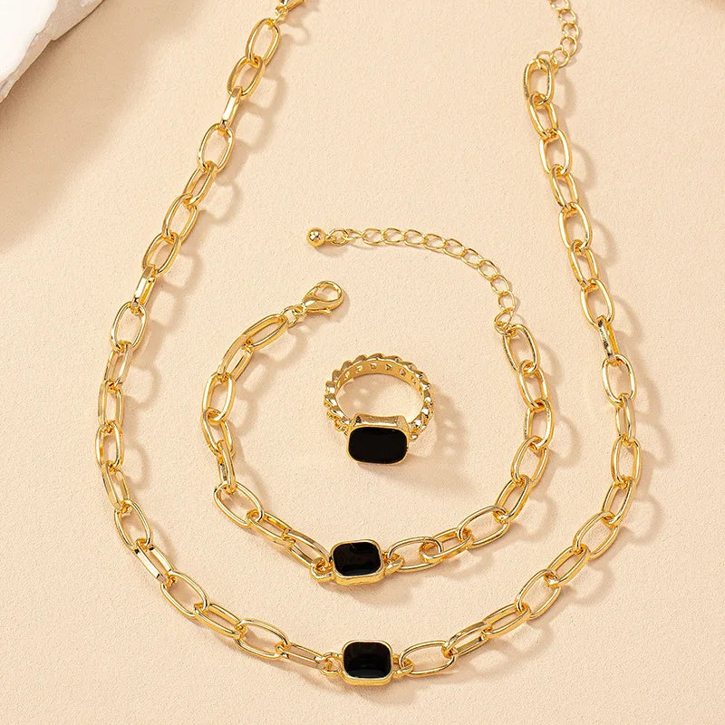 Geometrisches Schmuckset: Halskette, Armband & Ohrringe mit Blumen-Design