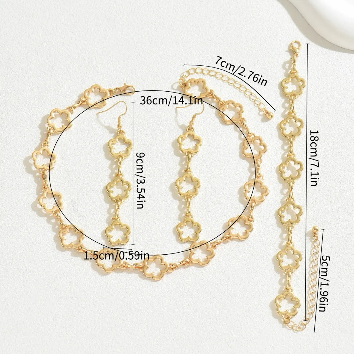 Geometrisches Schmuckset: Halskette, Armband & Ohrringe mit Blumen-Design