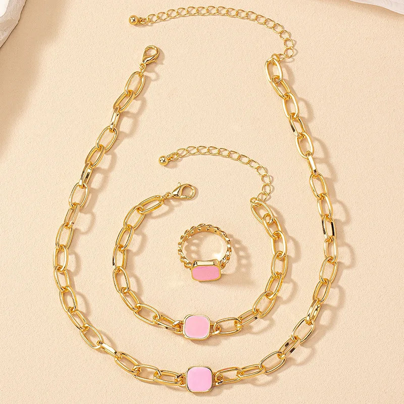 Geometrisches Schmuckset: Halskette, Armband & Ohrringe mit Blumen-Design