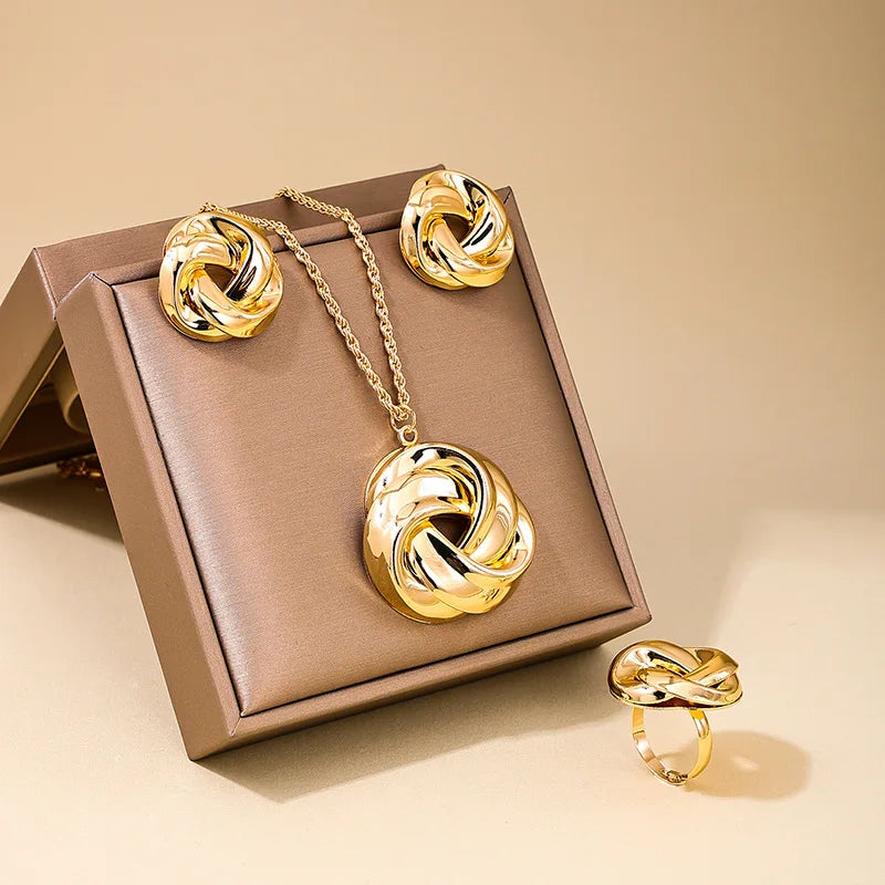 Geometrisches Schmuckset: Halskette, Armband & Ohrringe mit Blumen-Design